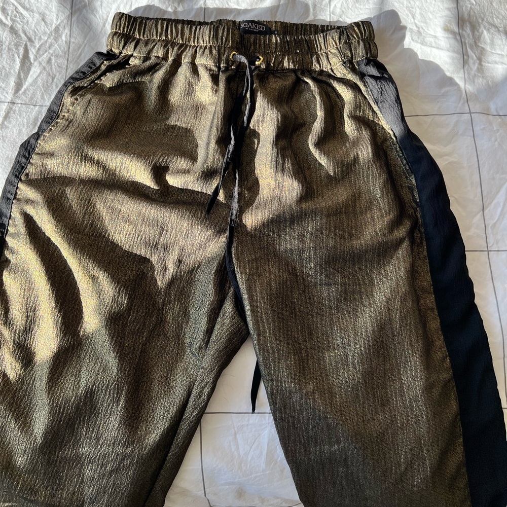 Brand: Soaked in Luxury. Bought from Revolve. Gold Metallic Joggers w/ black.